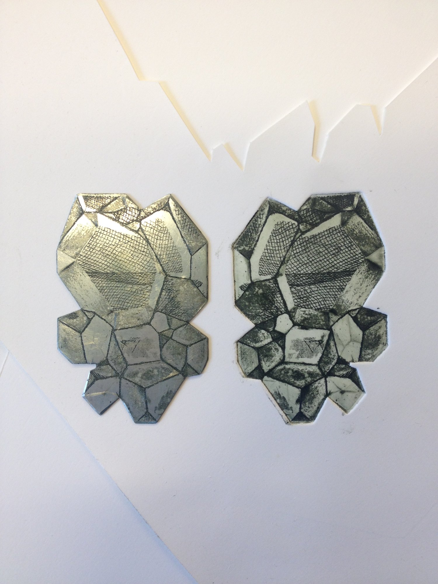 Zinc plate beside its print