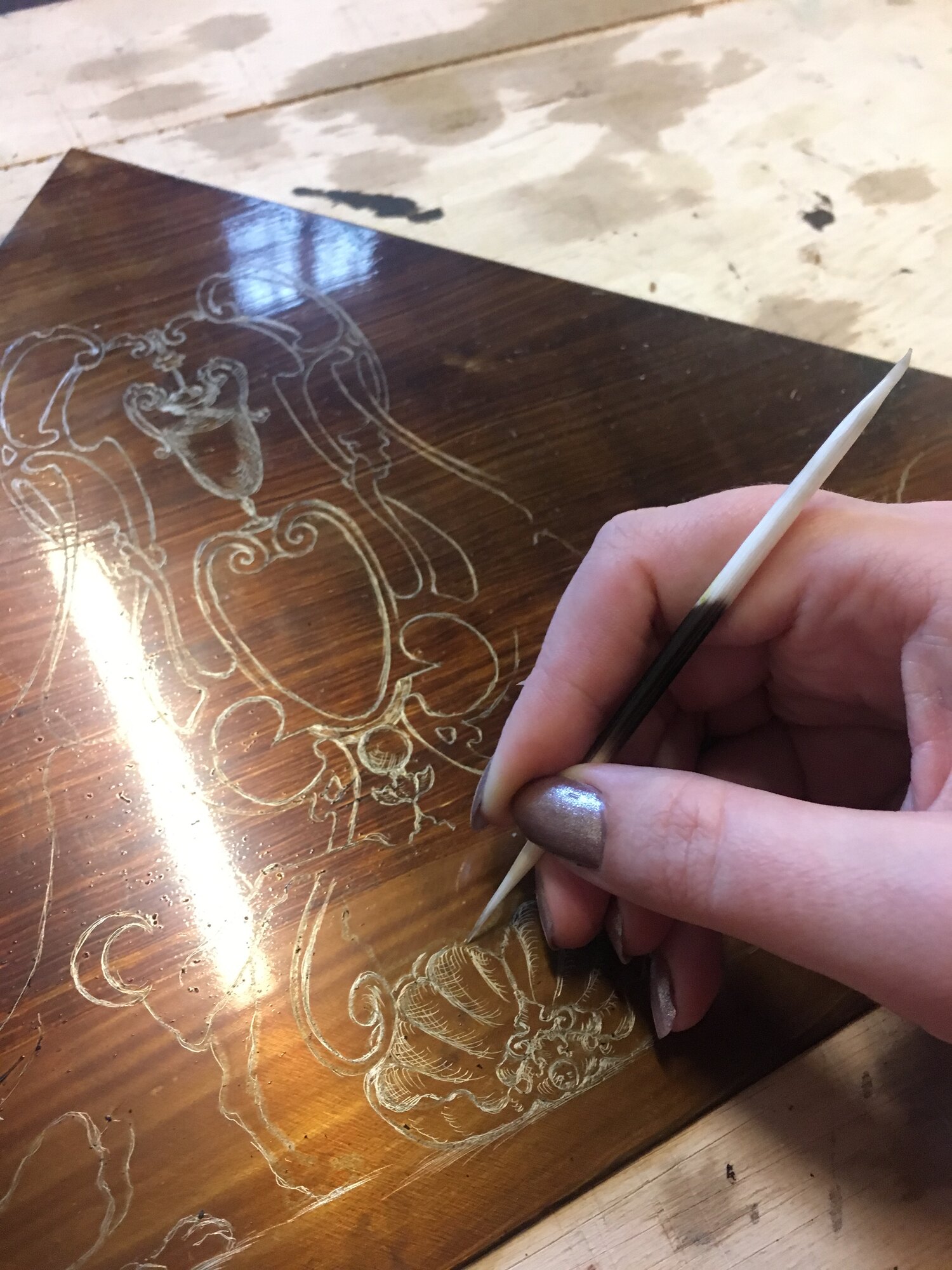 Drawing through the ground on an etching plate