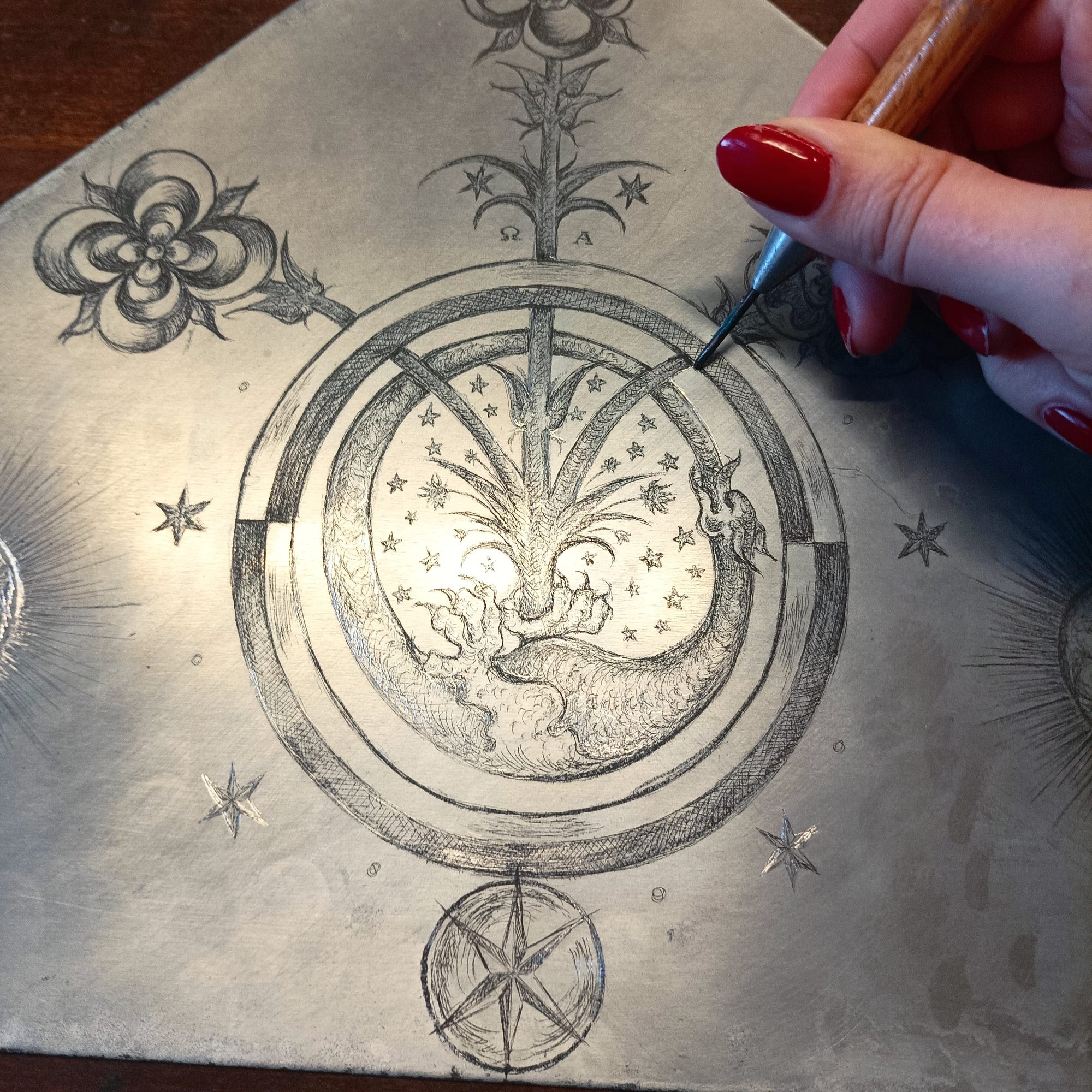 K. Lious drawing on a zinc plate for Spagiria